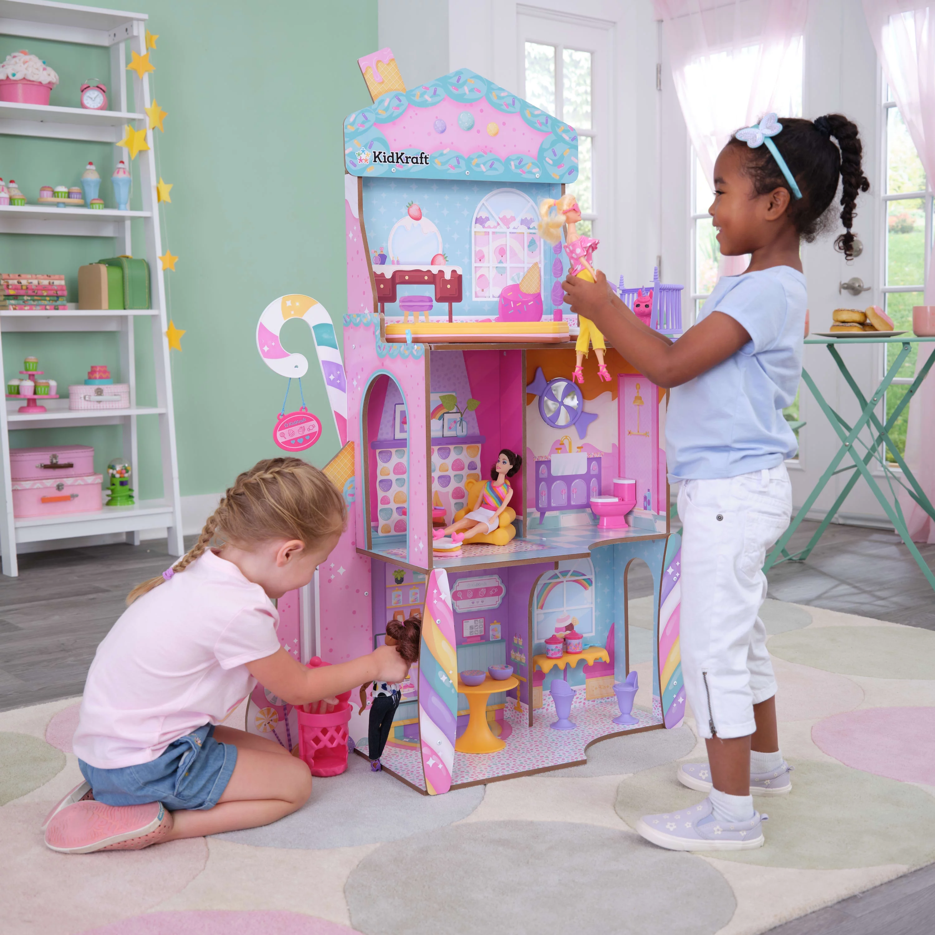 KidKraft Candy Castle Wooden Dollhouse with 28 Accessories, Ages 4 & up