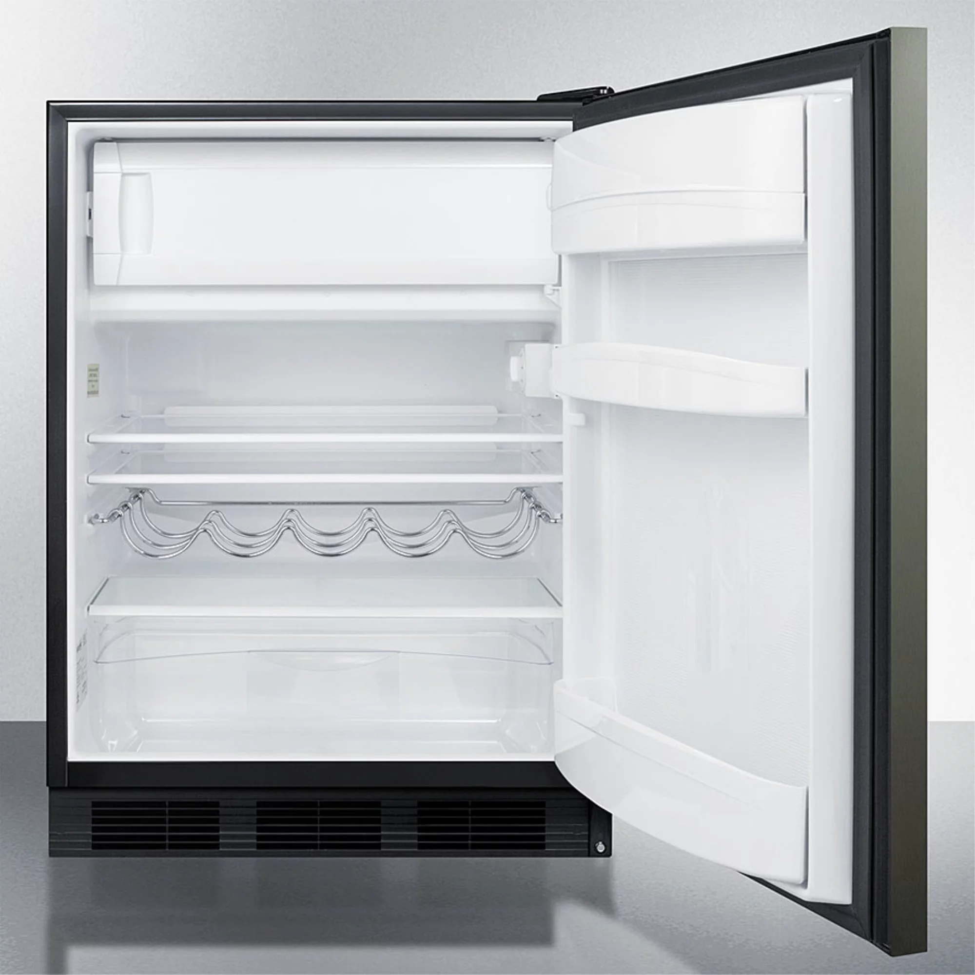 Built-in undercounter refrigerator-freezer for residential use, cycle defrost with black stainless steel wrapped door, horizontal handle, and black cabinet
