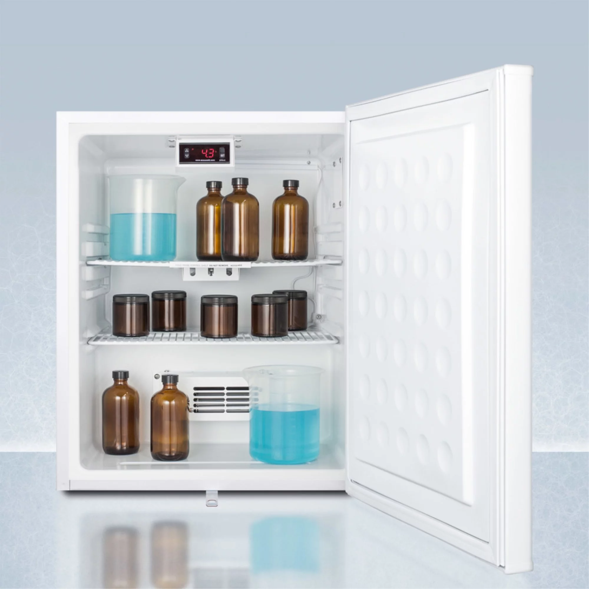 Compact auto defrost all-refrigerator with digital thermostat, internal fan, front lock, and probe hole for user-installed monitoring equipment