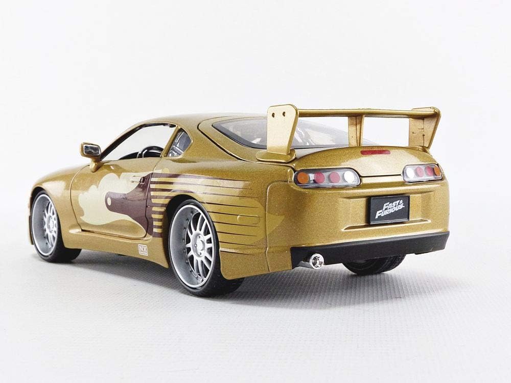 Jada 2 Fast 2 Furious Slap Jack's Toyota Supra Die-Cast Collectible Toy Vehicle Car, Gold with Decals, 1: 24 Scale, Copper