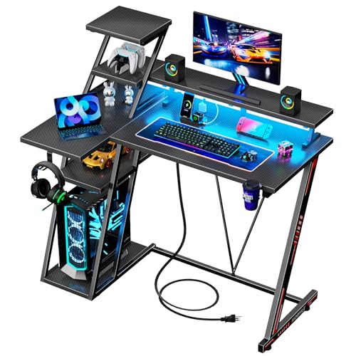 L Shaped Gaming Desk with LED Lights & Power Outlet, 47 Inch Computer Desk with Extra Storage Shelves, Reversible Gamer Workstations with Monitor Stand for Bedroom, Carbon Fiber Black