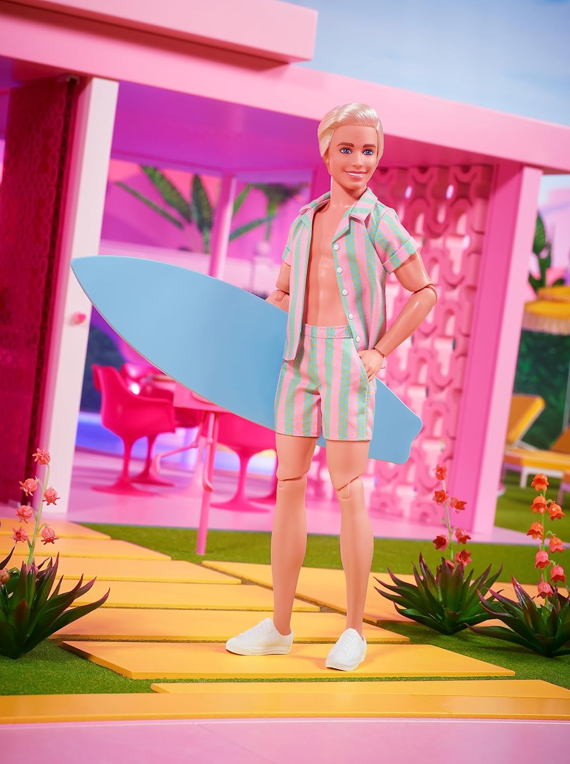Barbie The Movie Ken Doll, Collectible Wearing Pastel Pink & Green Striped Beach Matching Set with Surfboard & White Sneakers