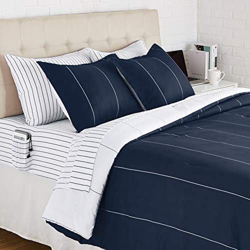 Amazon Basics 7-Piece Reversible Microfiber Bed-in-a-Bag with Elastic Storage Pockets, Full/Queen, Navy Stripe, Striped